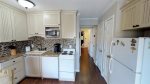 Fully functional kitchenette with appliances, cookwares, Keurig Coffee Maker, and a dishwasher